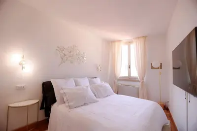 Letto o letti in una camera di Palazzo Vecchio - LIFT - Jacuzzi