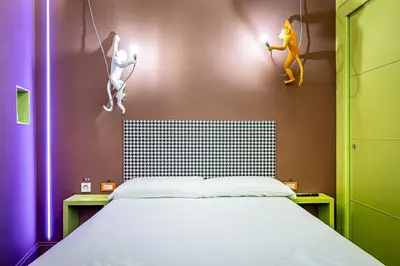 Letto o letti in una camera di Pop Tower Florence