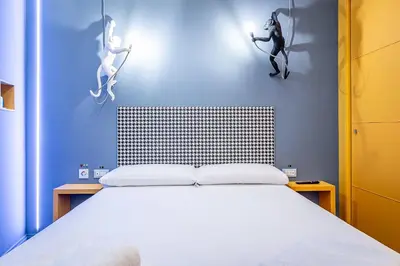 Letto o letti in una camera di Pop Tower Florence