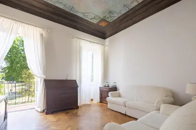 Area soggiorno di Florence Large Frescoed Apartment