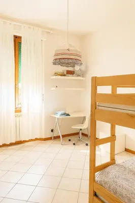 Letto o letti in una camera di Le Stanze di Barbara