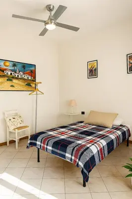 Letto o letti in una camera di Le Stanze di Barbara