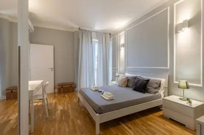 Letto o letti in una camera di Un Nido di Charme in Florence-Tramvia Parking