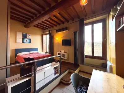 Letto o letti in una camera di Sweet Home Sweet Wine