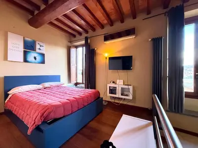 Letto o letti in una camera di Sweet Home Sweet Wine