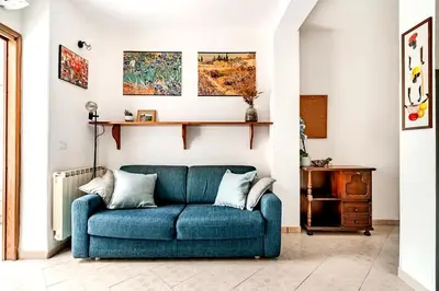 Area soggiorno di Heart of Florence Apartment