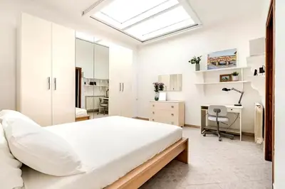 Letto o letti in una camera di Heart of Florence Apartment