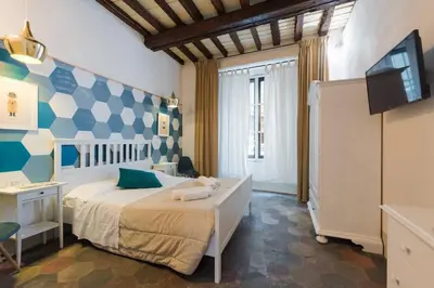 Letto o letti in una camera di Keys of Italy -F4 Santa Croce one bedroom