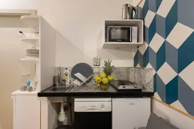 Cucina o angolo cottura di Keys of Italy -F4 Santa Croce one bedroom
