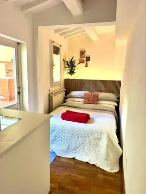 Letto o letti in una camera di La Corte di San Lorenzo