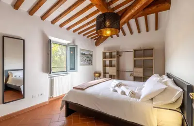 Letto o letti in una camera di Appartamento Elisa, immerso nella natura e vicino a Firenze