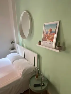 Letto o letti in una camera di Nina in Boboli