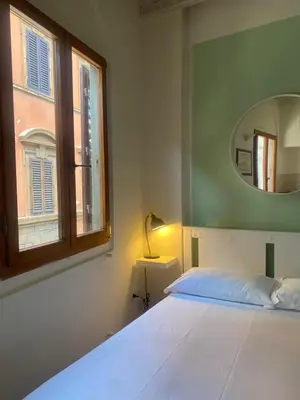 Letto o letti in una camera di Nina in Boboli