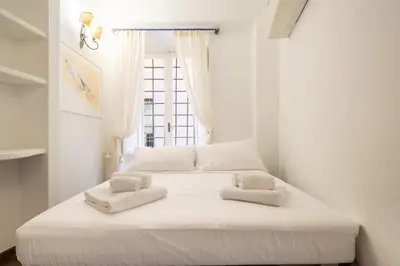 Letto o letti in una camera di The Florence City Loft