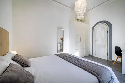 Letto o letti in una camera di YD Duomo design & comfort
