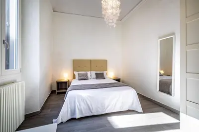 Letto o letti in una camera di YD Duomo design & comfort