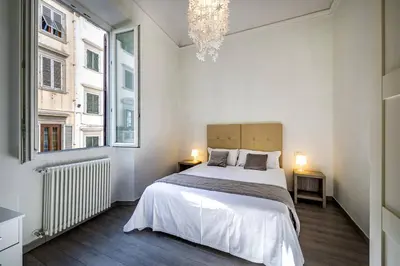 Letto o letti in una camera di YD Duomo design & comfort