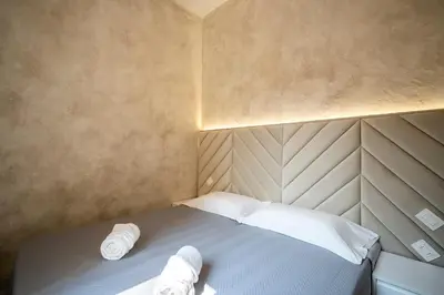 Letto o letti in una camera di Dream Florence