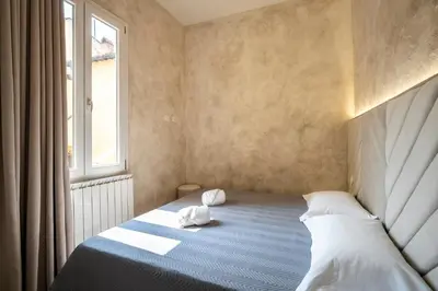 Letto o letti in una camera di Dream Florence