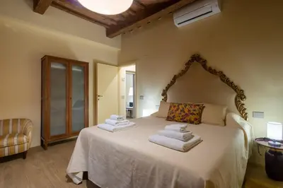 Letto o letti in una camera di Casa Jagua'