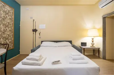 Letto o letti in una camera di Casa Jagua'