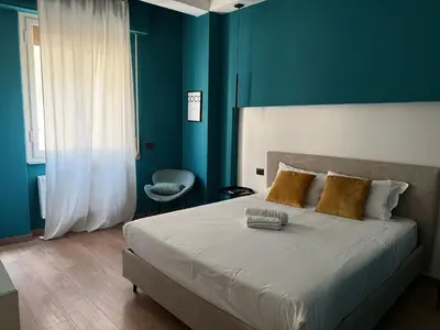 Letto o letti in una camera di GuestHost - Ponte Vecchio Charming Nest