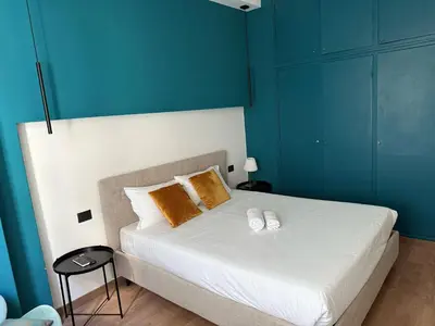 Letto o letti in una camera di GuestHost - Ponte Vecchio Charming Nest