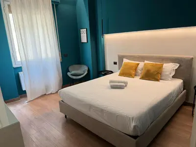 Letto o letti in una camera di GuestHost - Ponte Vecchio Charming Nest