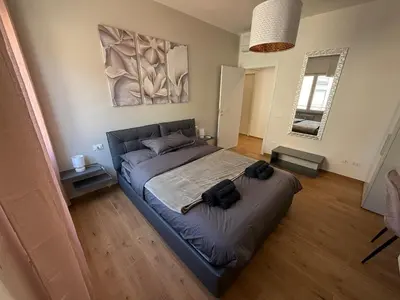 Letto o letti in una camera di Villa Strozzi - Modern Apartament