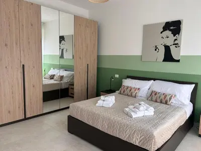 Letto o letti in una camera di Casa Camilla