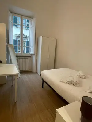 Letto o letti in una camera di Caravaggio