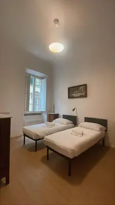 Letto o letti in una camera di Caravaggio