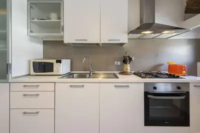 Cucina o angolo cottura di Libertà 3 bedrooms by MMega