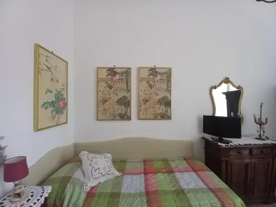 Letto o letti in una camera di Casone Apartment