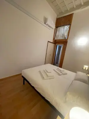 Letto o letti in una camera di Caravaggio1