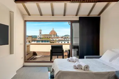 Letto o letti in una camera di Le Bijou Firenze Lux View Jacuzzi 3 Terrazze