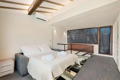 Letto o letti in una camera di Le Bijou Firenze Lux View Jacuzzi 3 Terrazze