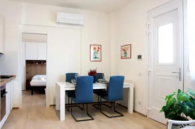Letto o letti in una camera di 15min to Downtown, Welcoming Apt near tram T1