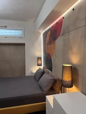 Letto o letti in una camera di Basement Art Bedroom