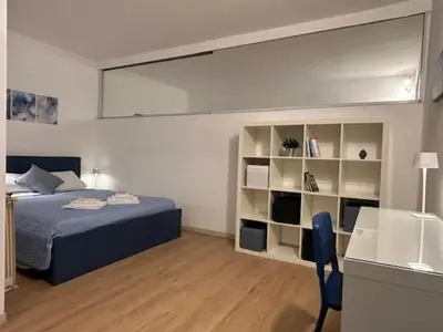 Letto o letti in una camera di Appartamento Puliti