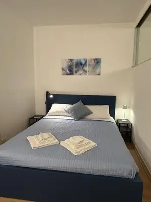 Letto o letti in una camera di Appartamento Puliti