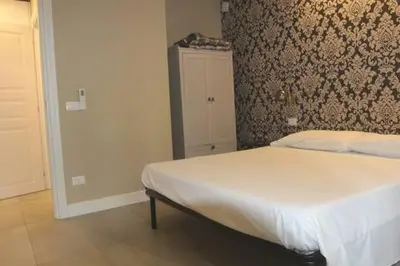 Letto o letti in una camera di Casa Odino Bilocale