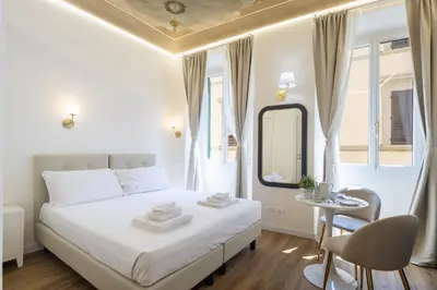 Letto o letti in una camera di Florence Charming Apartments