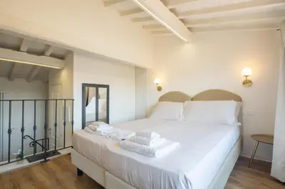Letto o letti in una camera di Florence Charming Apartments