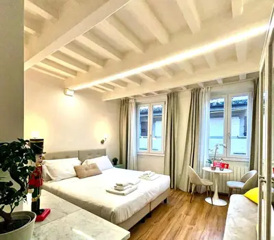 Letto o letti in una camera di Florence Charming Apartments