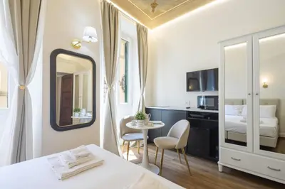 Letto o letti in una camera di Florence Charming Apartments