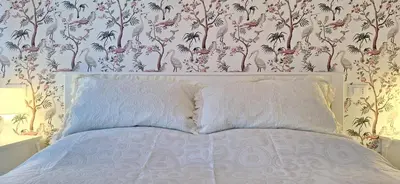 Letto o letti in una camera di Il Nido di Artemisia