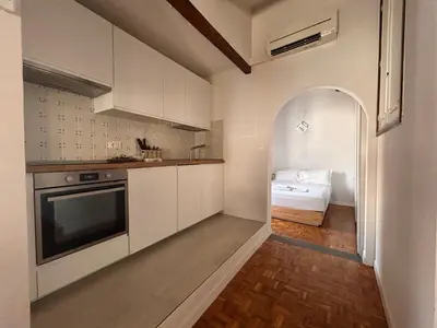 Cucina o angolo cottura di Florentine rooftop apartment - FlorenceHospitality