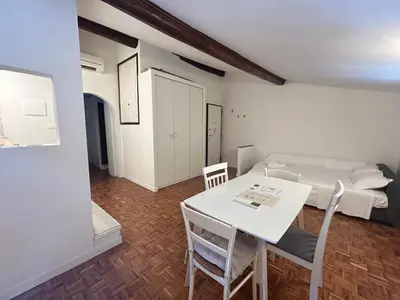 Letto o letti in una camera di Florentine rooftop apartment - FlorenceHospitality