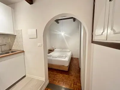 Letto o letti in una camera di Florentine rooftop apartment - FlorenceHospitality